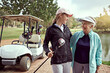 © peopleimages.com - Golf, women and happy on course with hug, bonding and sport together outdoor for fun. Senior mom, cart and game with club, fitness and workout for health and wellness with love, joy and golfer