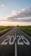 © Muhammad Ishaq - Straight road marked with 2025 stretches toward a serene, cloud dotted horizon Vertical Mobile Wallpaper