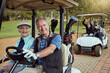 © peopleimages.com - Couple, happy and drive golf cart for hobby, sports and recreation with weekend, bonding and fitness. Senior people, fun and romance on course for game, practice and club competition with leisure