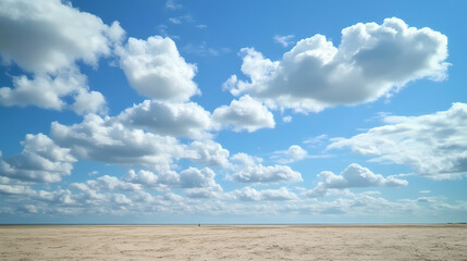 Wall Mural - Fluffy clouds drift across the vast blue sky above a sandy beach, stretching towards the distant horizon. Drift. Illustration