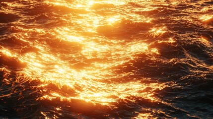 Poster - As the sun dips below the horizon, golden light dances on the ocean waves, creating a mesmerizing glow that transforms the tranquil water into a radiant spectacle near the shore