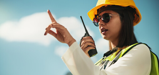 Poster - Radio, construction and woman talking in city for communication, contact and maintenance. Civil engineering, architecture and worker for planning, building infrastructure and renovation outdoors