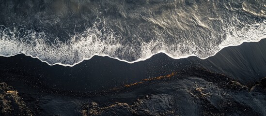 Poster - Aerial View of Waves Gently Hitting Black Sand at Punaluu Beach in Hawaii