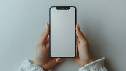 Hands holding mobile phone with blank white screen, touch gesture for app concept