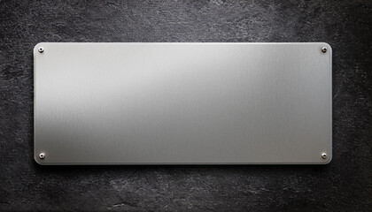 Wall Mural - Blank metal rectangular sign on dark textured wall background. Empty template. Mock-up. Close-up.