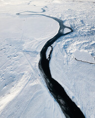 Wall Mural - iceland. aerial view of the river. winter landscape from a drone. journey around the golden ring in 