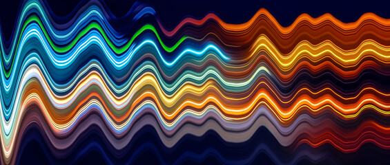 Wall Mural - Waves of colorful trail lights. Abstract Rainbow light waves trails on the dark background