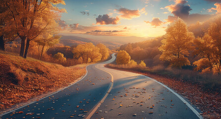 Wall Mural - an Autumn landscape with a curving back country road. Trees both sides of the road, sunset sky in background. full colored leaves at their peak of the fall season.