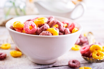 Wall Mural - Concept of breakfast food, colorful corn flakes