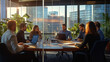 © BestFootageFirst - Team Discussion on Strategy in a Sunlit Office