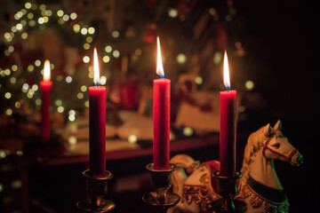 Rite with a burning candle, night mystery atmosphere, Christmas eve, Yule or another day