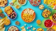 © phianguma - A colorful spread of processed food options designed for a party setting, illustrating the fun and convenience of ready-to-serve snacks