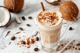 Vegan coconut latte smoothie on marble table with copy space