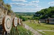 © Irina - Archers practice teamwork and precision on a professional range in a scenic green setting