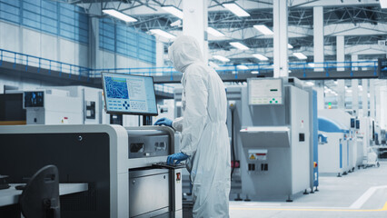 Fototapete - Printed Circuit Board Production At Electronics Factory: Scientist In Sterile Suit Using Soldering Jet Printer To Make Motherboards For Powerful Processors. Computer Hardware Manufacturing.