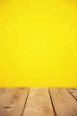 Poster - A wooden table top stands out against a bright yellow pastel colored background with selective focus emphasizing its center._00002_