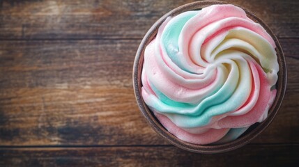 Poster - Colorful handmade marshmallow dessert in a bowl on a rustic wooden background viewed from above enticing sweet treat design