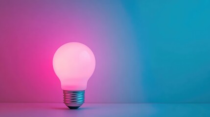 Poster - Colorful illuminated light bulb with a modern design on a gradient background showcasing vibrant hues of pink and blue.