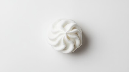 Poster - White marshmallow treat on a light white background showcasing a soft and fluffy texture perfect for food styling and design projects.