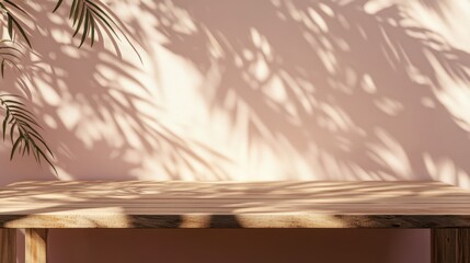 Poster - Empty wooden table with leaves shadows on a pink wall ideal for showcasing cosmetics, food, or jewelry in branding presentations.