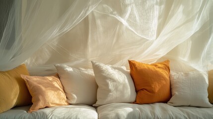 Poster - Cozy couch adorned with numerous pillows and draped in a soft sheer veil creating a tranquil and inviting living space atmosphere