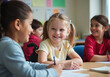 © Galeno - smiling young girl wheelchair participates engages students diverse