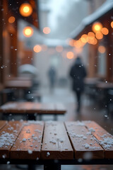 Aufkleber - A serene wooden table top stands empty amidst a winter wonderland scene of gentle snowfall and soft bokeh cafe lights._00002_
