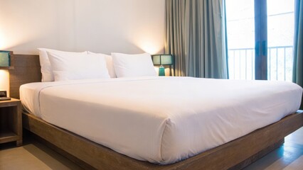Aufkleber - A serene bedroom with a lowprofile platform bed adorned with crisp white linen. Light wood nightstands flank the bed each holding a single decorative item. Soft curtains filter the