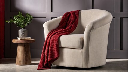 Aufkleber - An inviting reading nook with a softly rounded armchair in light beige linen paired with a small natural wood side table and a woolen throw d over the chair set beside a potted