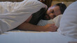 © Yuliia - Caucasian man lying on bed trying sleep awake insomnia male guy late night bedroom home sleepless looking contemplation bedtime anxiety difficulty thinking disturbed sleeping problems worried medicine