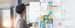 © peopleimages.com - Woman, sticky notes and office for thinking on research, problem solving and vision for campaign. Female person, contemplating statistics and glass wall for solution, brainstorming and mood board