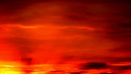 Poster - Abstract dark red and yellow sky background with burning sky effect, and rays of sunlight during sunset. Topics: hot colors, cloudy background, weather, meteorology, climate, air space, atmosphere