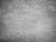 © Vera - A gray concrete wall. rough cracked cement, texture of stone concrete, plastered stone wall.