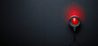 © Suritong - Close-up of a red indicator light on a dark background, symbolizing power or status.