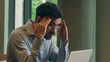 © Yuliia - Indian male guy businessman Arabian man tired exhausted business worker freelancer online work laptop in cafe stress health headache sad upset displeased angry mistake computer breakdown fail trouble