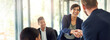 © peopleimages.com - Business, employees or handshake in office with partnership in investment project and funding proposal success. Financial investor, people and shaking hands for b2b negotiation agreement with banner
