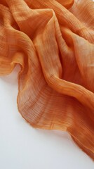Poster - An exquisite amber-colored fabric drapes elegantly, revealing intricate textures that invite touch and admiration. The warm hue evokes feelings of comfort and sophistication in any setting
