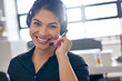© peopleimages.com - Portrait, call center and smile with business woman in office for communication, contact us and sales agent. Telemarketing, crm and help desk with person in agency for consulting and hotline