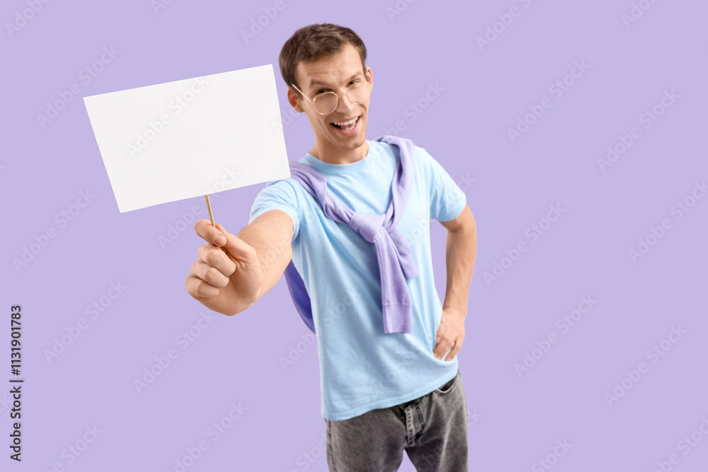 Young man on lilac background
