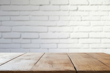 Poster - Wooden table in front of a white brick wall.