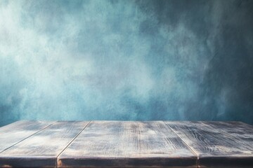 Poster - Wooden table with a textured blue background.