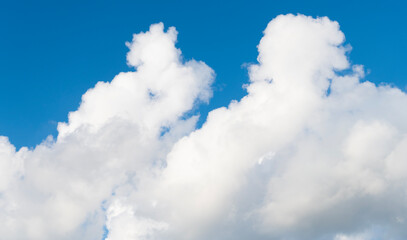 Wall Mural - Beautiful view of blue sky with clouds. Partly cloudy. Background cloud summer. Cloud summer. Sky cloud clear with sunset. Natural sky cinematic sky with clouds background