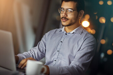 Poster - Businessman, night and accountant on laptop for news, investment research and budget for profit. Economy growth, bokeh and financial advisor on technology for network, typing and accounting report