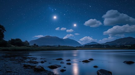  Serene night landscape with mountains, lake, stars, and moon.