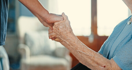 Wall Mural - Senior woman, holding hands and support in nursing home for care, help and kindness. Closeup, comfort and patient in retirement for empathy, medical assistance or health with nurse in rehabilitation