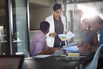 Poster - Business people, documents and meeting with statistics for report, company analytics or review at office desk. Group, employees or analyst with chart or graph for discussion on revenue or improvement