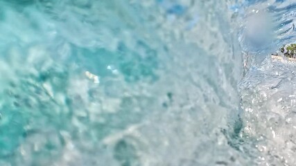 Aufkleber - Athletic surfer carves the wave in a tropical ocean. Maldives