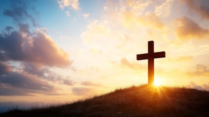 Fototapete - A wooden cross stands atop a grassy hill, bathed in warm sunlight filtering through clouds during a tranquil moment at golden hour