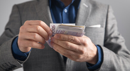 Canvas Print - Man counting money. Business. Finance