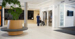 © Gorodenkoff - Healthcare Personnel Assisting Senior Patient in Wheelchair, Waiting for Elevator to Arrive to the Lobby
